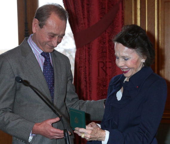 Leslie Caron receives an honorary citizen medal from Paris Mayor Bertrand Delanoe